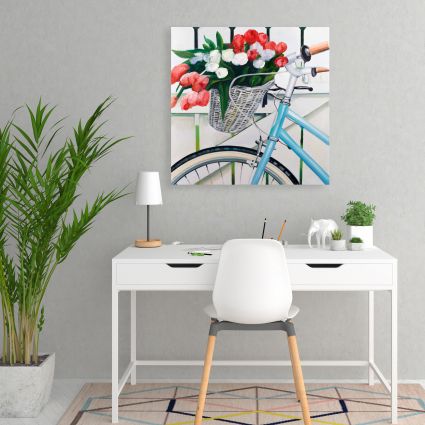 Bicycle with tulips flowers in basket