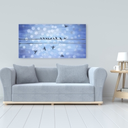 Canvas 24 x 48 - Birds on a wire with a clear blue sky