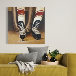 Canvas 36 x 36 - Hockey player ties his skates