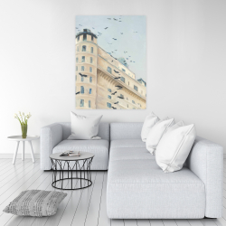 Canvas 36 x 48 - Birds flying in front of a building