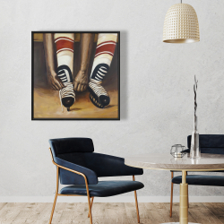 Framed 36 x 36 - Hockey player ties his skates