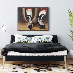 Framed 36 x 48 - Hockey player ties his skates