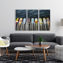 Toile 24 x 36 - Pagaies colorées sur le quai