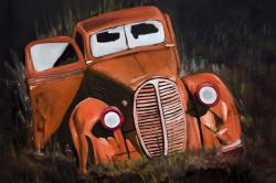 Humpy old car by night