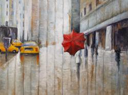 Red umbrella in the street