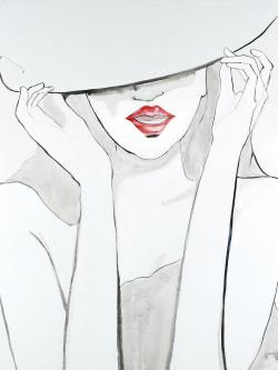 Femme avec grand chapeau