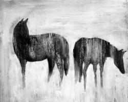 Horses silhouettes in the mist