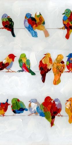Beaucoup d'oiseaux colorés sur un fil