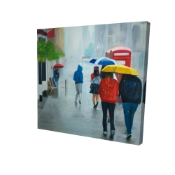 People walking under umbrella by a rainy day