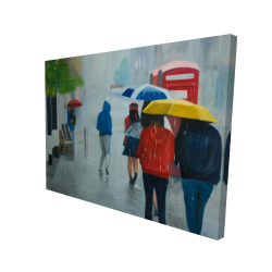 People walking under umbrella by a rainy day