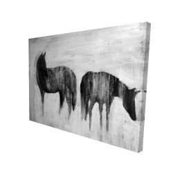 Horses silhouettes in the mist