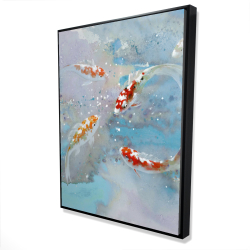 Koi fish swimming in blue water