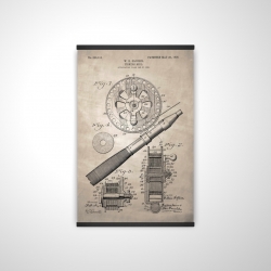 Beige blueprint of a fishing reel