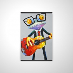 Drôle de grenouille à la guitare