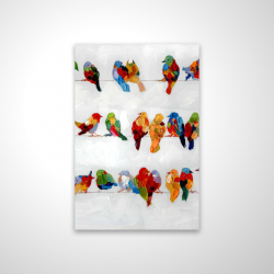 Beaucoup d'oiseaux colorés sur un fil