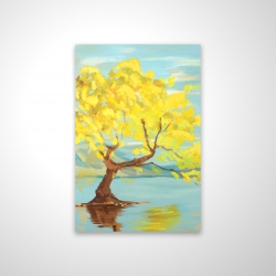 Spring lanscape with a tree in a lake