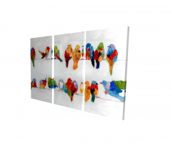 Beaucoup d'oiseaux colorés sur un fil
