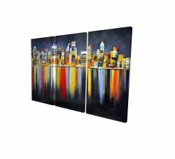 Colorful reflection of a cityscape by night