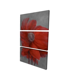 Fleur rouge dans le vent