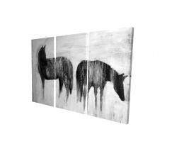 Horses silhouettes in the mist