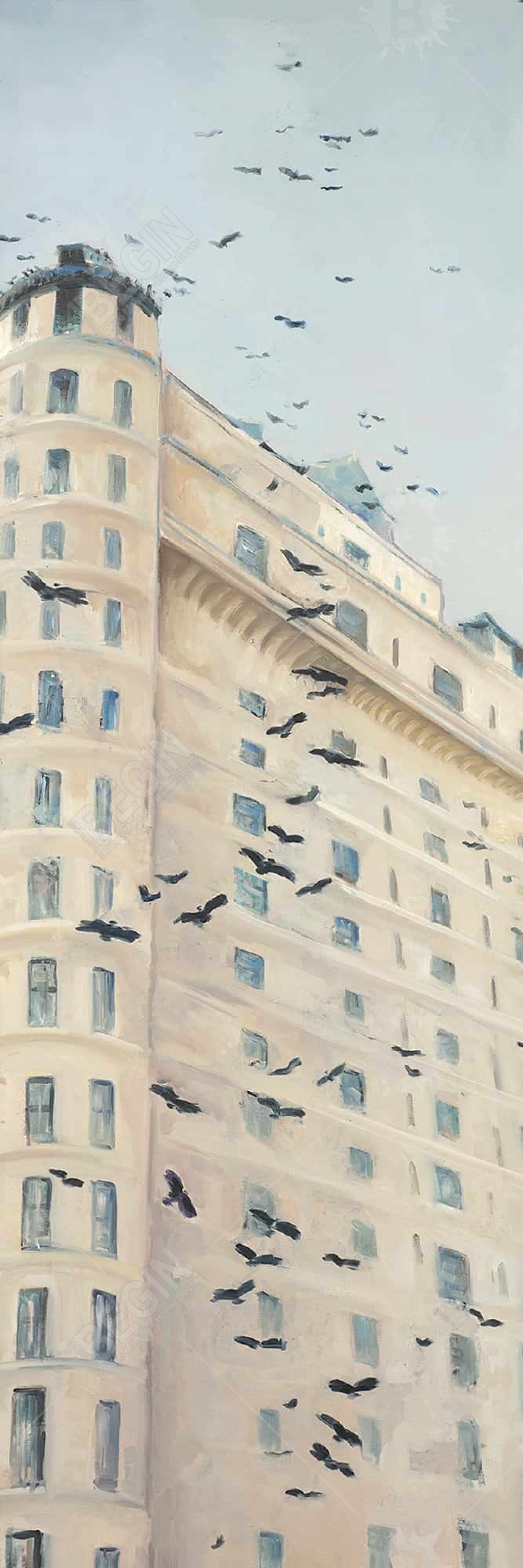 Birds flying in front of a building